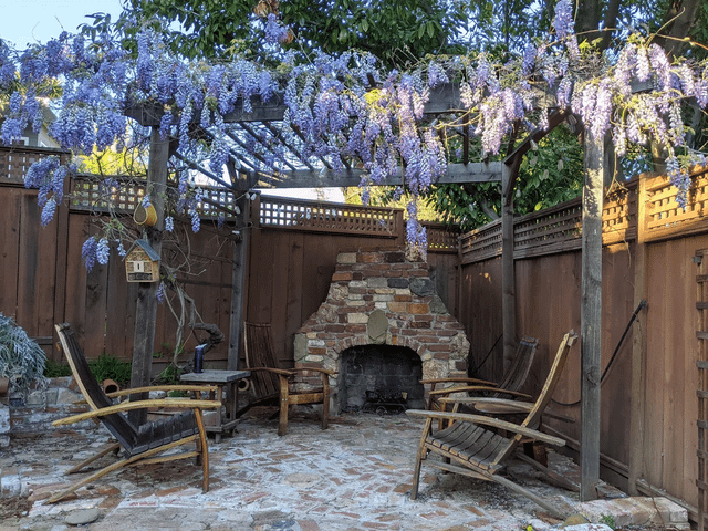 I love my little patio when the wisteria is in full bloom – Reddit Post