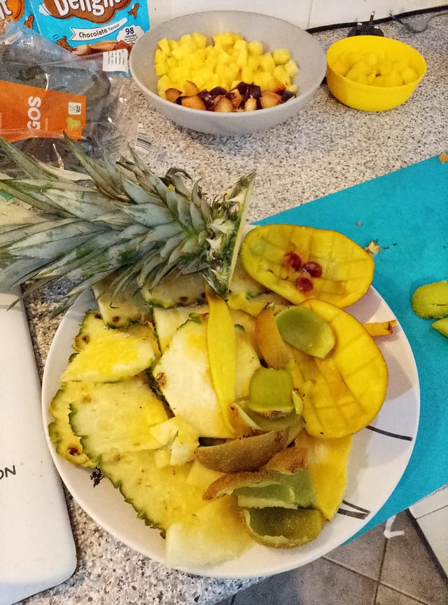Could I chop up this fruit waste and put it in my strawberry pots?
