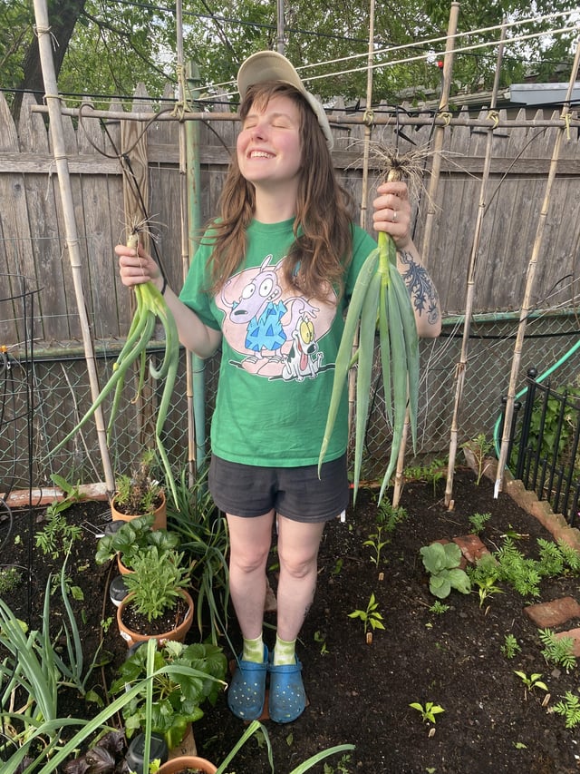 posing with my green onion like guys do with fish
