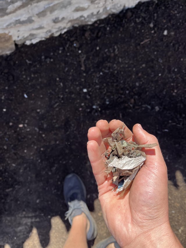 topsoil and compost with plastic and other contaminants